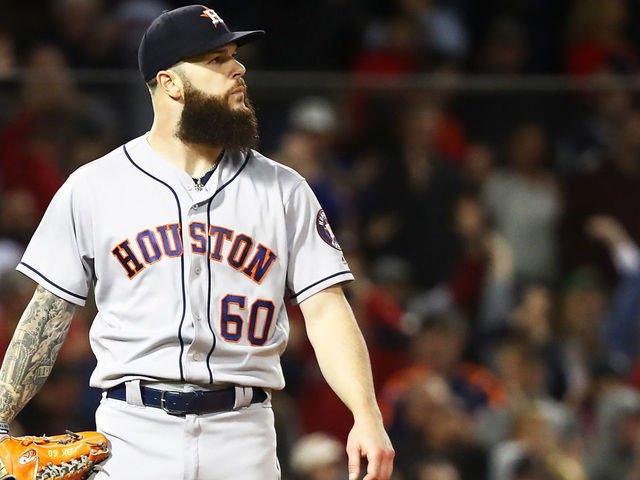 BOSTON, MA - SEPTEMBER 9: Dallas Keuchel #60 of the Houston Astros looks on as J.D. Martinez of the Boston Red Sox rounds the bases on his three-run home run in the fifth inning of a game at Fenway Park on September 9, 2018 in Boston, Massachusetts.