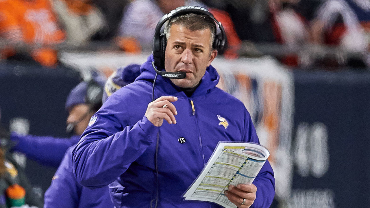 CHICAGO, IL - NOVEMBER 18: Minnesota Vikings offensive coach John DeFilippo talks into his headset in action during a NFL game between the Chicago Bears and the Minnesota Vikings on November 18, 2018 at Soldier Field, in Chicago, Illinois.