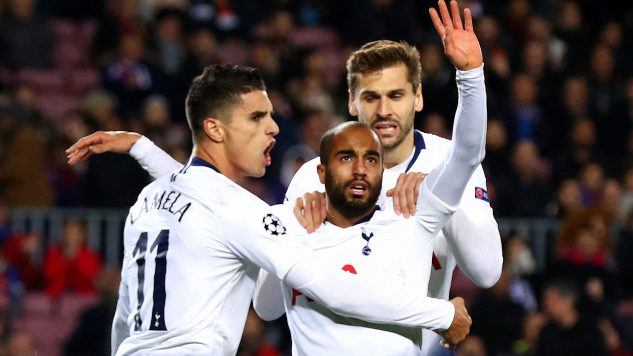 BARCELONA, SPAIN - DECEMBER 11: Lucas Moura of Tottenham Hotspur (C) celebrates after scoring his team's first goal with Erik Lamela and Fernando Llorente during the UEFA Champions League Group B match between FC Barcelona and Tottenham Hotspur at Camp Nou on December 11, 2018 in Barcelona, Spain.