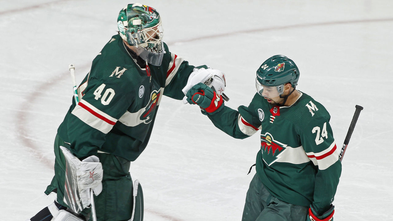 ST. PAUL, MN - DECEMBER 11: Matt Dumba #24 of the Minnesota Wild celebrates his 2nd period power play goal with Devan Dubnyk #40 of the Minnesota Wild during a game with the Montreal Canadiens at Xcel Energy Center on December 11, 2018 in St. Paul, Minnesota.