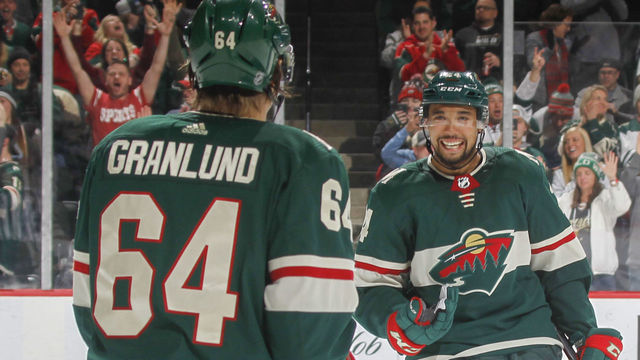 ST. PAUL, MN - JANUARY 22: (L-R) Mikael Granlund #64 and Matt Dumba #24 of the Minnesota Wild celebrate after scoring a goal against the Ottawa Senators during the game at the Xcel Energy Center on January 22, 2018 in St. Paul, Minnesota.