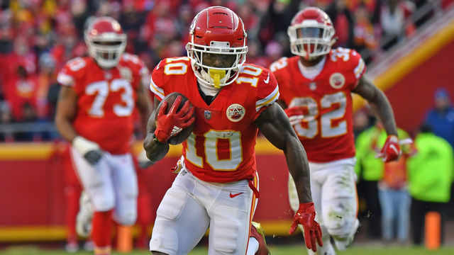 KANSAS CITY, MO - DECEMBER 09: Wide receiver Tyreek Hill #10 of the Kansas City Chiefs turns up field after catching a pass on a fourth down play late in the second half against the Baltimore Ravens on December 9, 2018 at Arrowhead Stadium in Kansas City, Missouri.