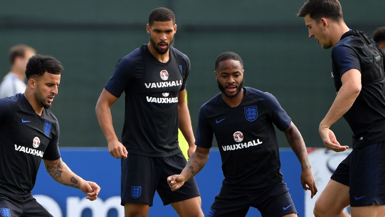 (L to R) England's defender Kyle Walker, midfielder Ruben Loftus-Cheek, forward Raheem Sterling and defender Harry Maguire take part in a training session in Repino, Russia on June 15, 2018 during the Russia 2018 World Cup football tournament.