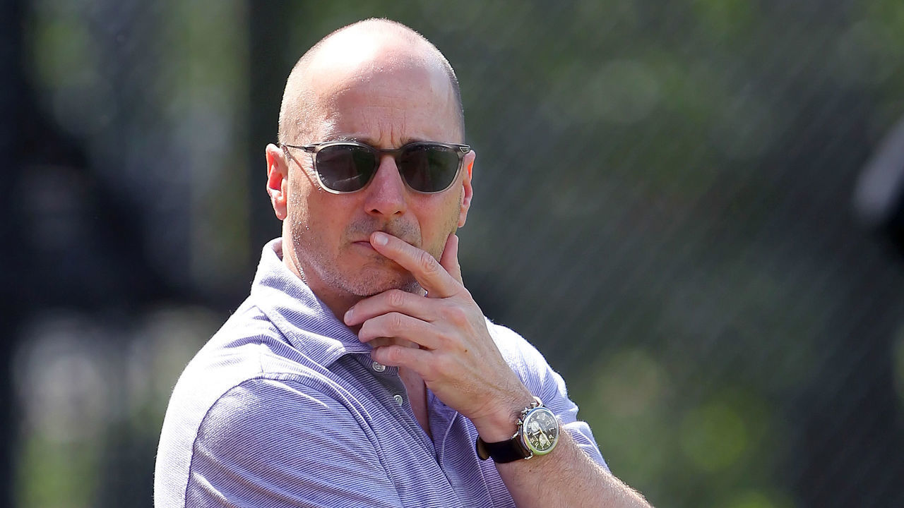 TAMPA, FL - FEB 20: Yankees General Manager Brian Cashman watches the pitchers workout during the New York Yankees spring training workout on February 20, 2018, at George M. Steinbrenner Field in Tampa, FL.