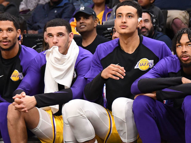 SAN JOSE, CA - OCTOBER 12: Josh Hart #3, Lonzo Ball #2, Kyle Kuzma #0 and Brandon Ingram #14 of the Los Angeles Lakers look on from the bench during a pre-season game against the Golden State Warriors on October 12, 2018 at the SAP Center in San Jose, California. NOTE TO USER: User expressly acknowledges and agrees that, by downloading and/or using this Photograph, user is consenting to the terms and conditions of the Getty Images License Agreement. Mandatory Copyright Notice: Copyright 2018 NBAE