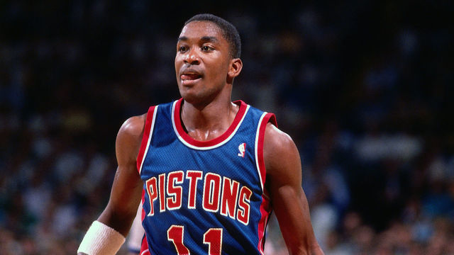 BOSTON, MA - 1986: Isiah Thomas #11 of the Detroit Pistons handles the ball against the Boston Celtics circa 1986 at the Boston Garden in Boston, Massachusetts. NOTE TO USER: User expressly acknowledges and agrees that, by downloading and/or using this photograph, user is consenting to the terms and conditions of the Getty Images License Agreement. Mandatory Copyright Notice: Copyright 1986 NBAE