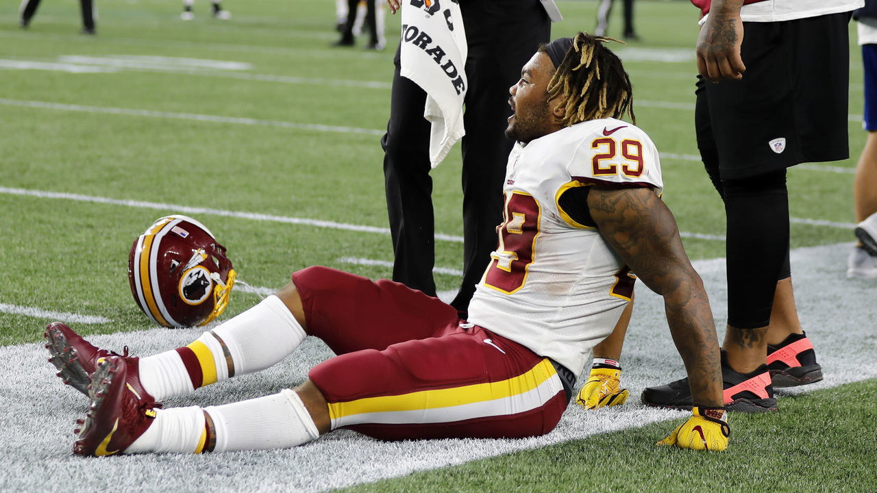 FOXBOROUGH, MA - AUGUST 09: Washington Redskins running back Derrius Guice (29) injured on the sideline during a preseason NFL game between the New England Patriots and the Washington Redskins on August 9, 2018, at Gillette Stadium in Foxborough, Massachusetts. The Patriots defeated the Redskins 26-17.