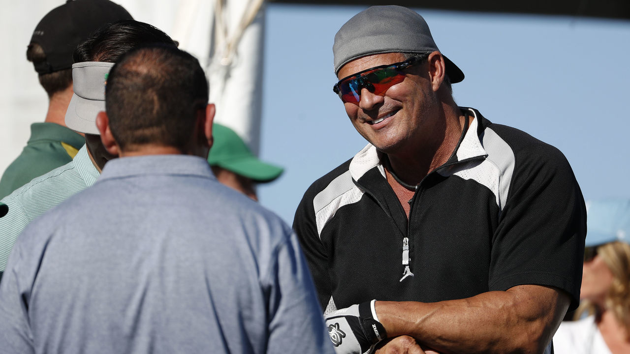 HAYWARD, CA - AUGUST 06: Oakland Athletics' Jose Canseco chats with teammates before teeing off for the celebrity shootout for the Ellie Mae Classic golf tournament at TPC Stonebrae in Hayward, Calif., on Monday, August 6, 2018. (Nhat V. Meyer/Bay Area News Group via Getty Images)