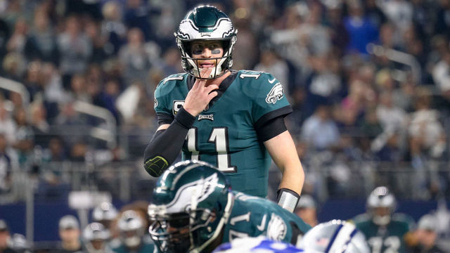 ARLINGTON, TX - DECEMBER 09: Philadelphia Eagles Quarterback Carson Wentz (11) looks over the defense during the game between the Philadelphia Eagles and Dallas Cowboys on December 9, 2018 at AT&T Stadium in Arlington, TX.
