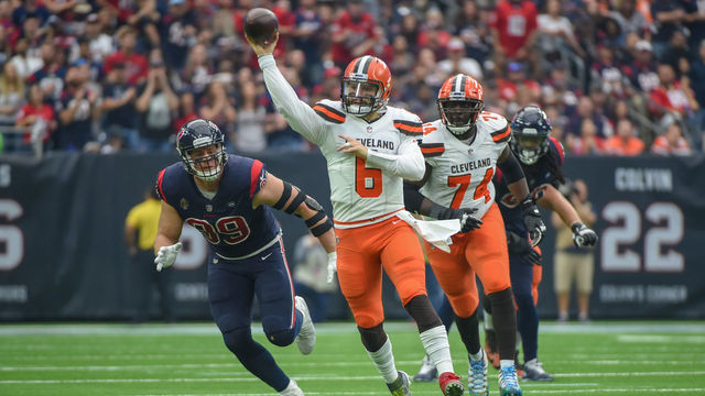 HOUSTON, TX - DECEMBER 02: Cleveland Browns Quarterback Baker Mayfield (6) scrambles from the pocket then throws over the middle as Houston Texans Defensive End J.J. Watt (99) gives chase during the football game between the Cleveland Browns and Houston Texans on December 2, 2018 at NRG Stadium in Houston, Texas.