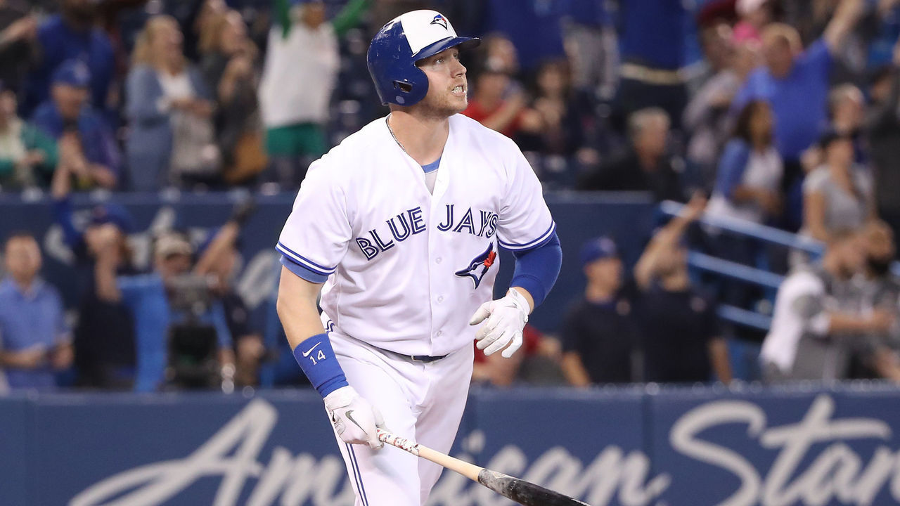 TORONTO, ON - SEPTEMBER 20: Justin Smoak #14 of the Toronto Blue Jays watches as he hits a game-winning solo home run in the ninth inning during MLB game action against the Tampa Bay Rays at Rogers Centre on September 20, 2018 in Toronto, Canada.