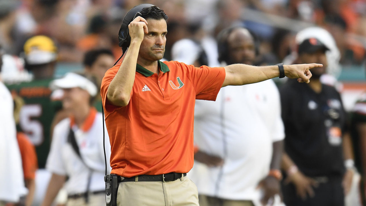 MIAMI GARDENS, FL - SEPTEMBER 23: University of Miami Defensive Coordinator, Manny Diaz, signals instructions during a college football game between the Toledo Rockets and the Miami Hurricanes on September 23, 2017 at Hard Rock Stadium in Miami Gardens, Florida.