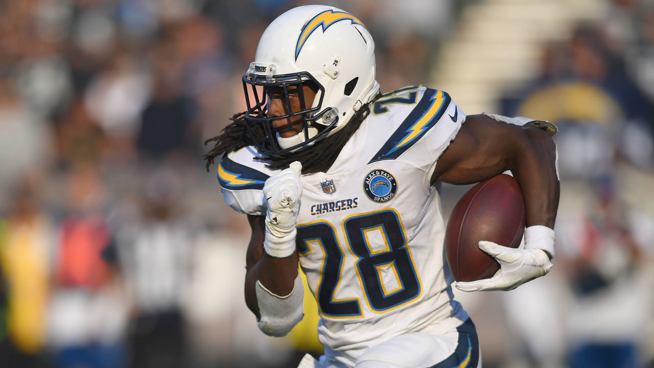 OAKLAND, CA - NOVEMBER 11: Melvin Gordon #28 of the Los Angeles Chargers carries the ball against the Oakland Raiders during the second half of their NFL football game at Oakland-Alameda County Coliseum on November 11, 2018 in Oakland, California.