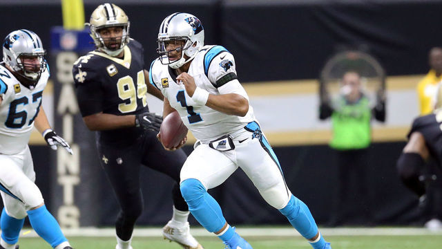 NEW ORLEANS, LA - JANUARY 07: Cam Newton #1 of the Carolina Panthers runs the ball against Cameron Jordan #94 of the New Orleans Saints during the first half of the NFC Wild Card playoff game at the Mercedes-Benz Superdome on January 7, 2018 in New Orleans, Louisiana.