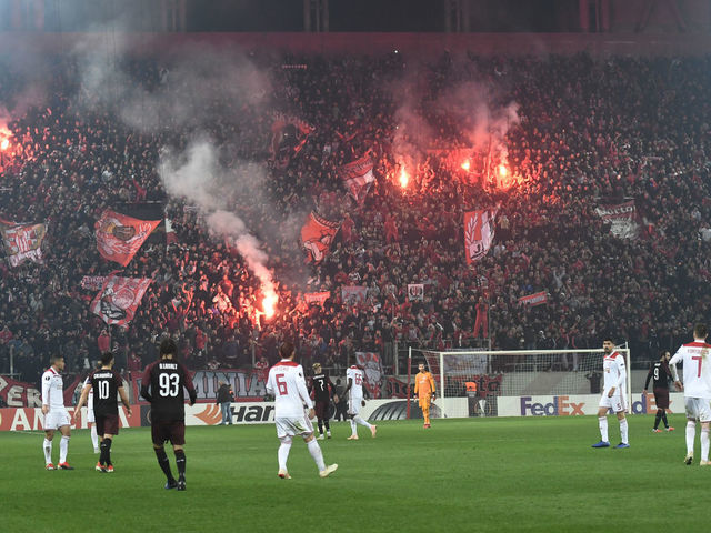 Olympiakos' fans celebrates during their UEFA league match Olympiacos FC and AC Milan at the Karaiskaki stadium in Piraeus on December 13, 2018.