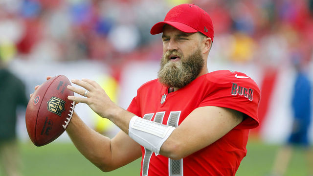TAMPA, FL - DEC 09: Ryan Fitzpatrick (14) of the Bucs warms up at the end of half-time during the regular season game between the New Orleans Saints and the Tampa Bay Buccaneers on December 09, 2018 at Raymond James Stadium in Tampa, Florida.