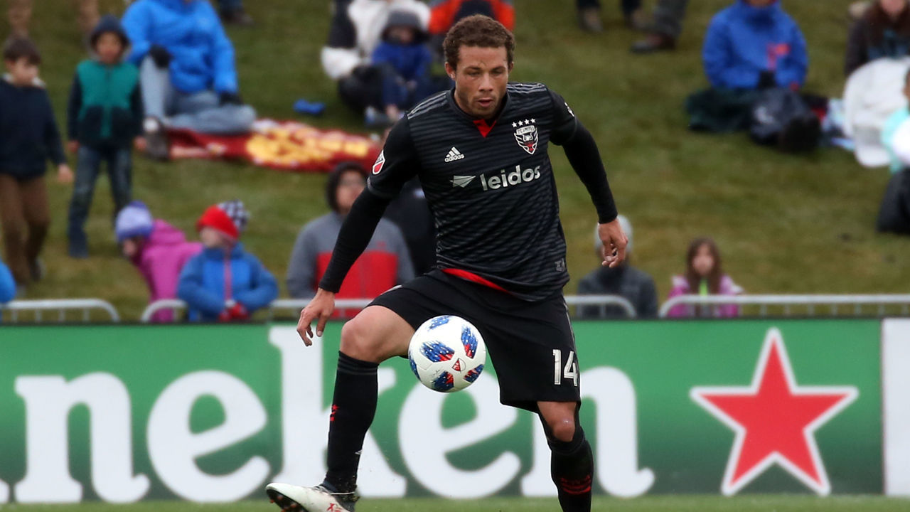 BOYDS, MD - MARCH 17: D.C. United midfielder Nick DeLeon (14) controls the ball during a MLS soccer match between D.C. United and the Houston Dynamo on March 17, 2018, at the Maryland Soccerplex, in Boyds, Maryland. The game ended in a 2-2 tie.