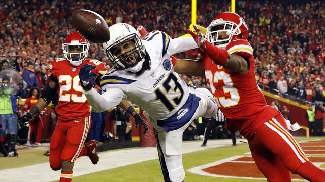 KANSAS CITY, MISSOURI - DECEMBER 13: Cornerback Kendall Fuller #23 of the Kansas City Chiefs breaks up a pass intended for wide receiver Keenan Allen #13 of the Los Angeles Chargers during the game at Arrowhead Stadium on December 13, 2018 in Kansas City, Missouri.
