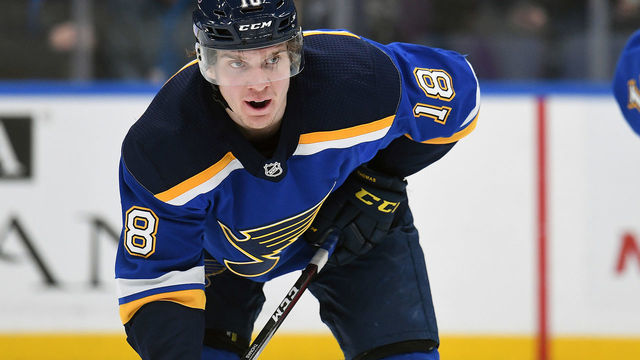 ST. LOUIS, MO. - DECEMBER 09: St. Louis Blues center Robert Thomas (18) gets ready to take a face off during a NHL game between the Vancouver Canucks and the St. Louis Blues on December 09, 2018, at Enterprise Center, St. Louis, MO.