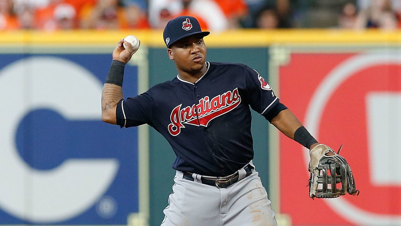HOUSTON, TX - OCTOBER 06: Jose Ramirez #11 of the Cleveland Indians throws out a runner at first base against the Houston Astros during Game Two of the American League Division Series at Minute Maid Park on October 6, 2018 in Houston, Texas.