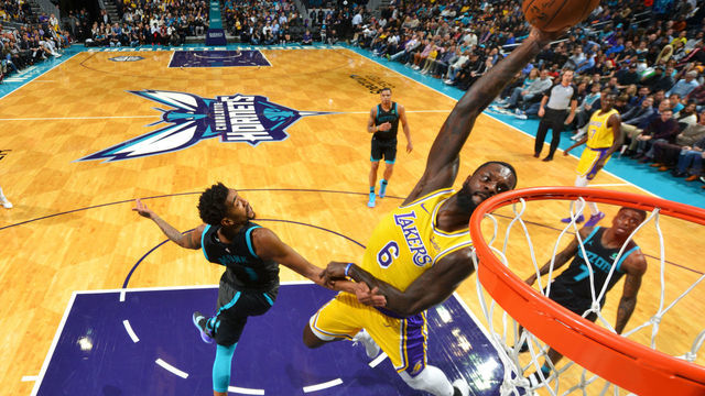 CHARLOTTE, NC - DECEMBER 15: Lance Stephenson #6 of the Los Angeles Lakers dunks the ball against the Charlotte Hornets on December 15, 2018 at Spectrum Center in Charlotte, North Carolina. Mandatory Copyright Notice: Copyright 2018 NBAE