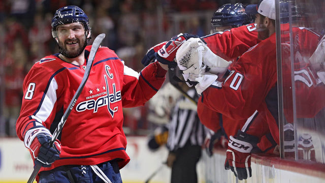 WASHINGTON, DC - DECEMBER 15: Alex Ovechkin #8 of the Washington Capitals celebrates after scoring in a shootout against the Buffalo Sabres at Capital One Arena on December 15, 2018 in Washington, DC.
