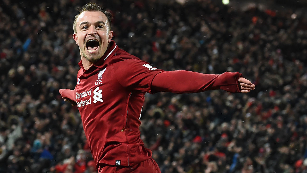 Liverpool's Swiss midfielder Xherdan Shaqiri celebrates after scoring their third goal during the English Premier League football match between Liverpool and Manchester United at Anfield in Liverpool, north west England on December 16, 2018.