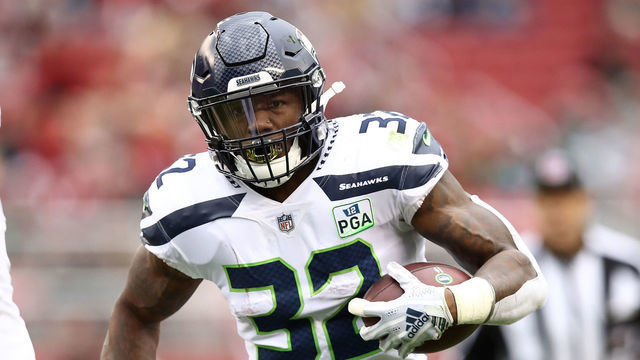 SANTA CLARA, CA - DECEMBER 16: Chris Carson #32 of the Seattle Seahawks rushes with the ball against the San Francisco 49ers during their NFL game at Levi's Stadium on December 16, 2018 in Santa Clara, California.