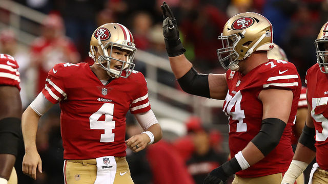 SANTA CLARA, CA - DECEMBER 16: Nick Mullens #4 of the San Francisco 49ers celebrates after a touchdown pass to Garrett Celek #88 during their NFL game against the Seattle Seahawks at Levi's Stadium on December 16, 2018 in Santa Clara, California.