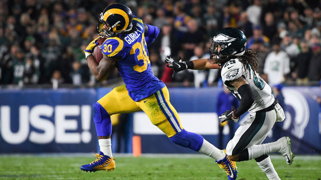 LOS ANGELES, CA - DECEMBER 16: Running back Todd Gurley #30 of the Los Angeles Rams beats free safety Avonte Maddox #29 of the Philadelphia Eagles around the corner during the second quarter at Los Angeles Memorial Coliseum on December 16, 2018 in Los Angeles, California.