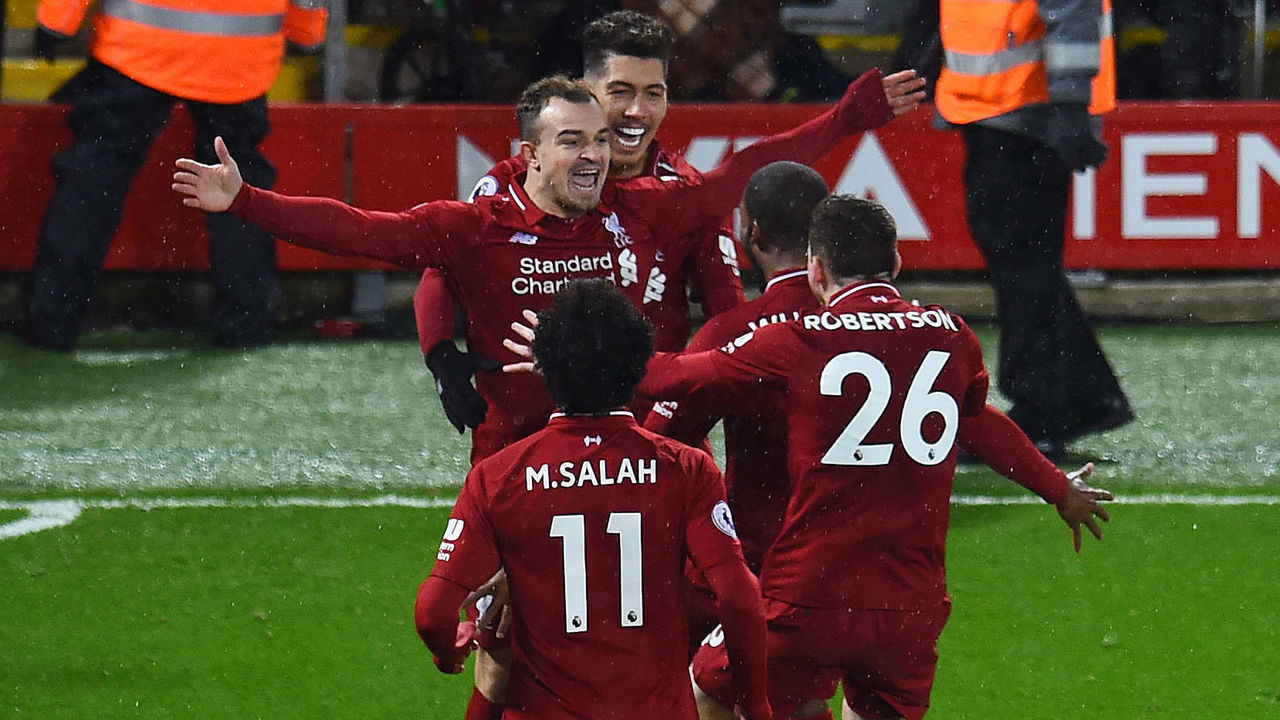 LIVERPOOL, ENGLAND - DECEMBER 16: (THE SUN OUT, THE SUN ON SUNDAY OUT) Xherdan Shaqiri of Liverpool FC celebrates after scoring a goal during the Premier League match between Liverpool FC and Manchester United at Anfield on December 16, 2018 in Liverpool, United Kingdom.