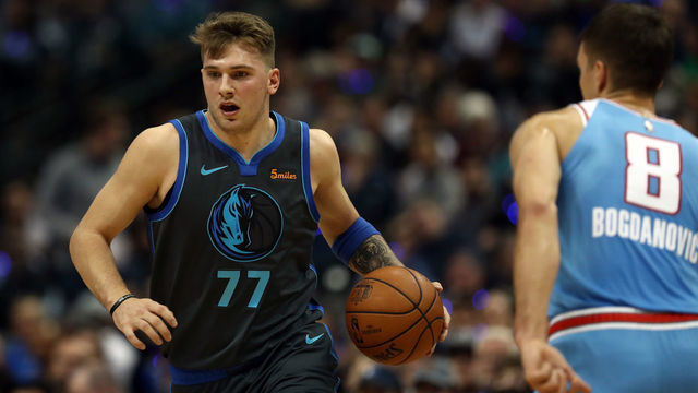 DALLAS, TEXAS - DECEMBER 16: Luka Doncic #77 of the Dallas Mavericks dribbles the ball against the Sacramento Kings at American Airlines Center on December 16, 2018 in Dallas, Texas.