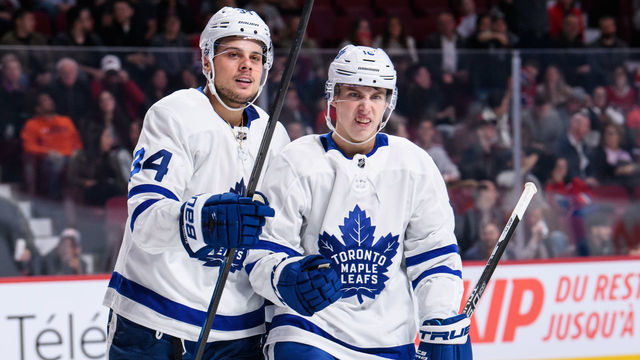 MONTREAL, QC - SEPTEMBER 26: Toronto Maple Leafs center Mitchell Marner (16) and Auston Matthews (34) celebrate during the third period of the NHL preseason game between the Toronto Maple Leafs and the Montreal Canadiens on September 26, 2018, at the Bell Centre in Montreal, QC