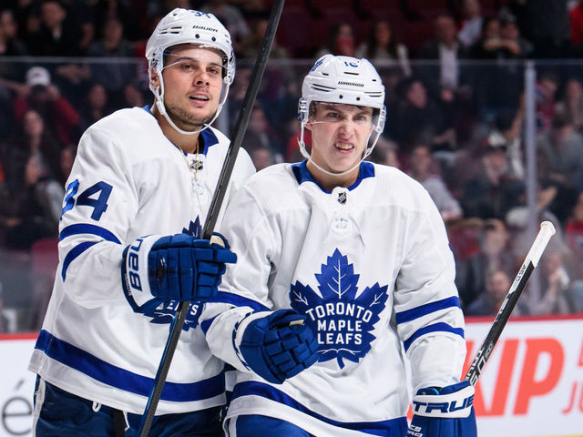 MONTREAL, QC - SEPTEMBER 26: Toronto Maple Leafs center Mitchell Marner (16) and Auston Matthews (34) celebrate during the third period of the NHL preseason game between the Toronto Maple Leafs and the Montreal Canadiens on September 26, 2018, at the Bell Centre in Montreal, QC