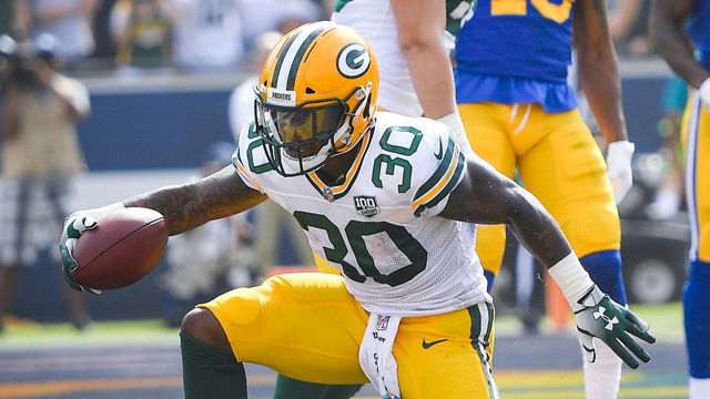 LOS ANGELES, CA - OCTOBER 28: Running back Jamaal Williams #30 of the Green Bay Packers celebrates after a touchdown in the first quarter at Los Angeles Memorial Coliseum on October 28, 2018 in Los Angeles, California.