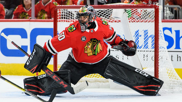 CHICAGO, IL - DECEMBER 09: Chicago Blackhawks goalie Corey Crawford (50) defends his net in the 2nd period during an NHL hockey game between the Montreal Canadiens and the Chicago Blackhawks on December 09, 2018, at the United Center in Chicago, IL.