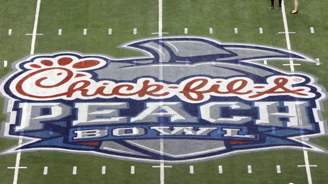 ATLANTA, GA - DECEMBER 31: The Peach Bowl logo at midfield of the College Football Playoff Semifinal at the Chick-fil-A Peach Bowl between the Washington Huskies and the Alabama Crimson Tide on December 31, 2016. Alabama defeated Washington by the score of 24-7 at the Georgia Dome in Atlanta, Georgia.