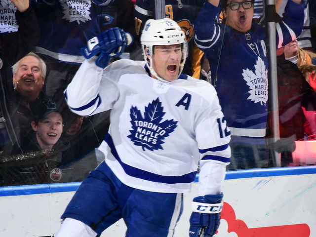 BUFFALO, NY - DECEMBER 4: Patrick Marleau #12 of the Toronto Maple Leafs celebrates his third period goal during an NHL game against the Buffalo Sabres on December 4, 2018 at KeyBank Center in Buffalo, New York. Toronto defeated Buffalo, 4-3, in overtime.