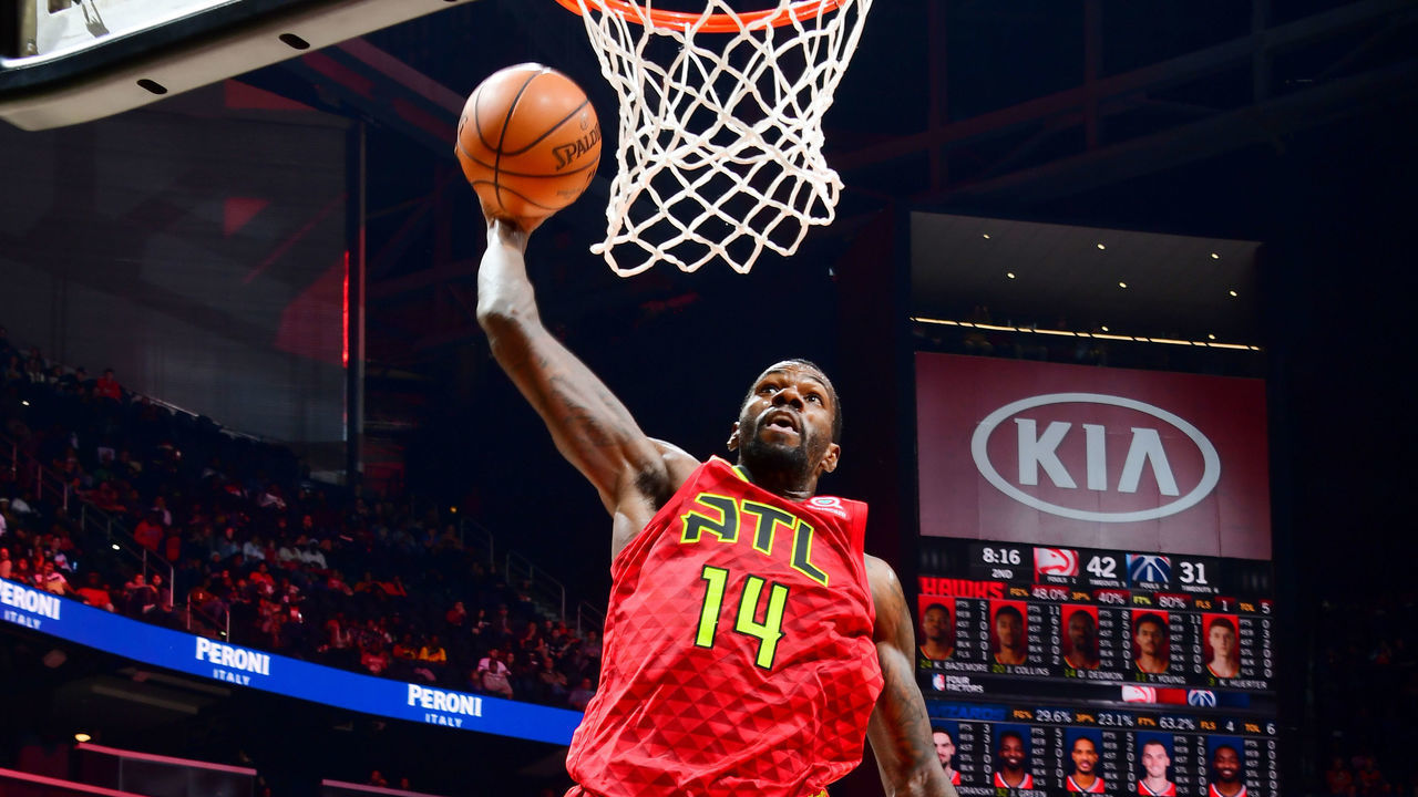 ATLANTA, GA - DECEMBER 18: Dewayne Dedmon #14 of the Atlanta Hawks goes up for a dunk against the Washington Wizards on December 18, 2018 at State Farm Arena in Atlanta, Georgia. NOTE TO USER: User expressly acknowledges and agrees that, by downloading and/or using this Photograph, user is consenting to the terms and conditions of the Getty Images License Agreement. Mandatory Copyright Notice: Copyright 2018 NBAE