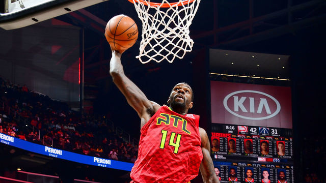 ATLANTA, GA - DECEMBER 18: Dewayne Dedmon #14 of the Atlanta Hawks goes up for a dunk against the Washington Wizards on December 18, 2018 at State Farm Arena in Atlanta, Georgia. NOTE TO USER: User expressly acknowledges and agrees that, by downloading and/or using this Photograph, user is consenting to the terms and conditions of the Getty Images License Agreement. Mandatory Copyright Notice: Copyright 2018 NBAE