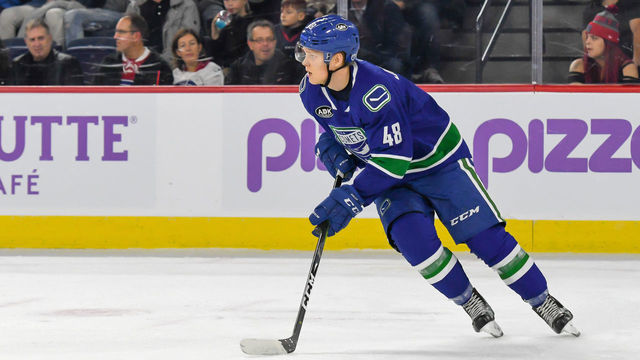 LAVAL, QC, CANADA - NOVEMBER 2: Olli Juolevi #48 of the Utica Comets starting the drive against the Laval Rocket at Place Bell on November 2, 2018 in Laval, Quebec.