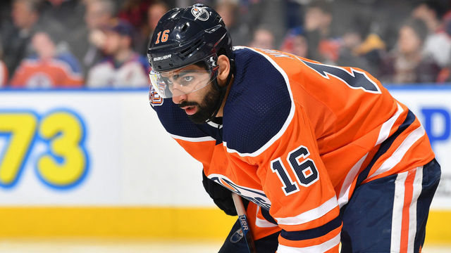 EDMONTON, AB - DECEMBER 14: Jujhar Khaira #16 of the Edmonton Oilers lines up for a face off the game against the Philadelphia Flyers on December 14, 2018 at Rogers Place in Edmonton, Alberta, Canada.