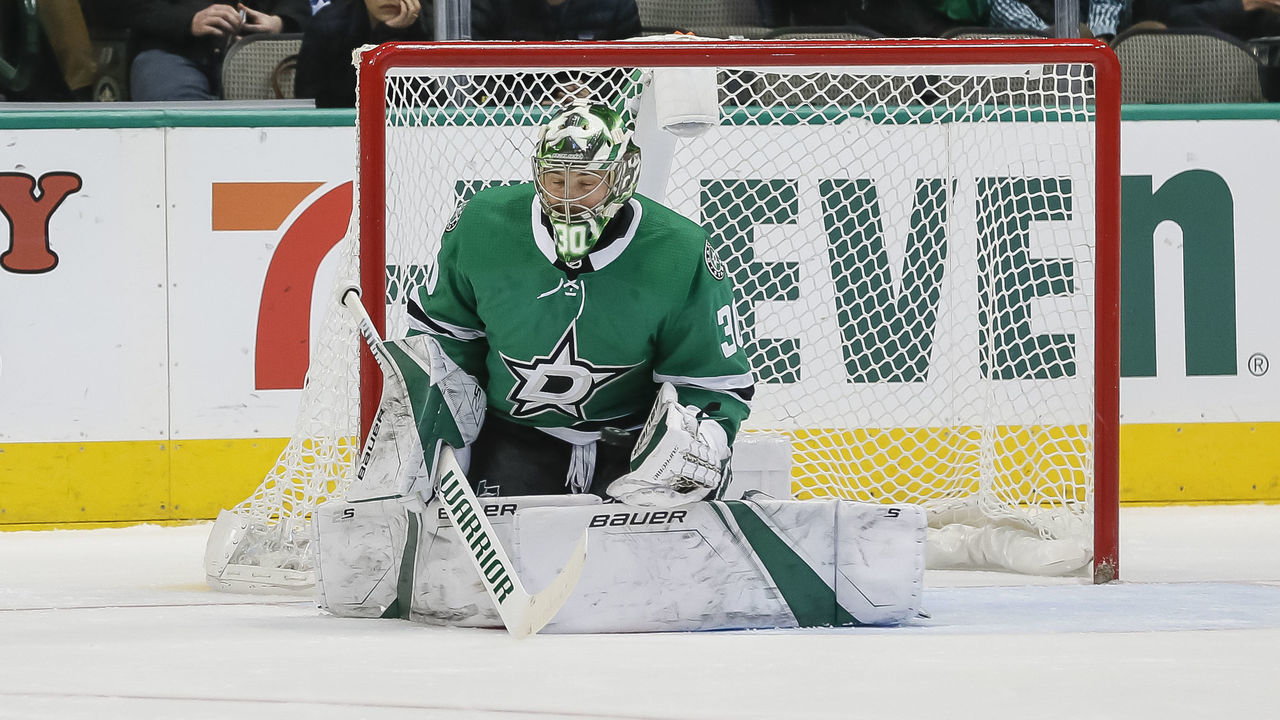 DALLAS, TX - DECEMBER 18: Dallas Stars goaltender Ben Bishop (30) blocks a shot during the game between the Dallas Stars and the Calgary Flames on December 18. 2018 at the American Airlines Center in Dallas Texas.