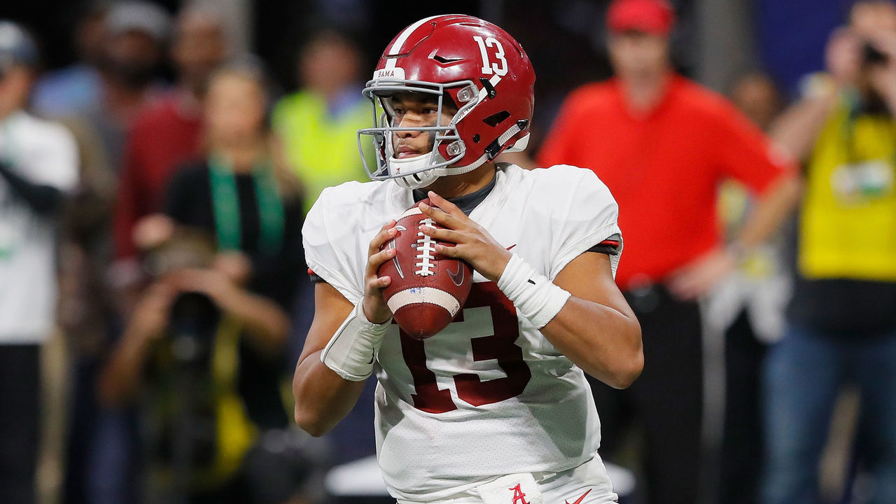 ATLANTA, GA - DECEMBER 01: Tua Tagovailoa #13 of the Alabama Crimson Tide looks to pass the ball in the second half against the Georgia Bulldogs during the 2018 SEC Championship Game at Mercedes-Benz Stadium on December 1, 2018 in Atlanta, Georgia.