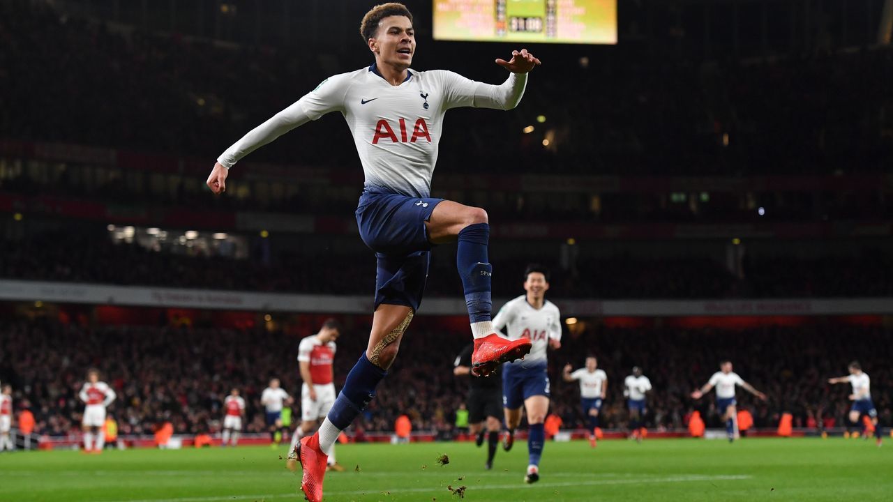 Tottenham Hotspur's English midfielder Dele Alli celebrates scoring their second goal during the English League Cup quarter-final football match between Arsenal and Tottenham Hotspur at the Emirates Stadium in London on December 19, 2018.