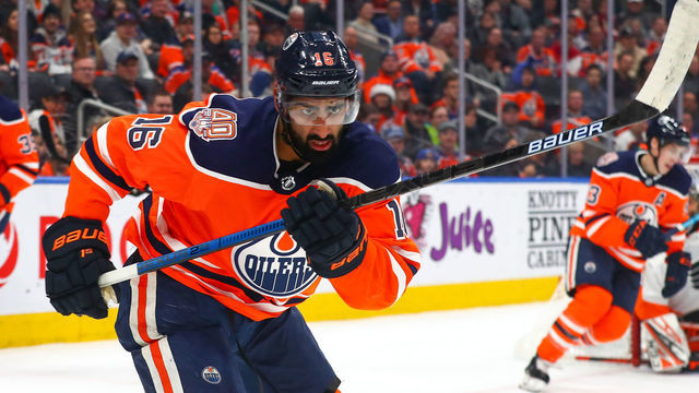 EDMONTON, AB - DECEMBER 14: Edmonton Oilers Left Wing Jujhar Khaira (16) skates towards a puck in the corner during the Edmonton Oilers game versus the Philadelphia Flyers on December 14, 2018 at Rogers Place in Edmonton, AB.