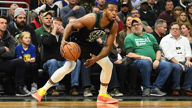 MILWAUKEE, WISCONSIN - DECEMBER 07: Sterling Brown #23 of the Milwaukee Bucks handles the ball during a game against the Golden State Warriors at Fiserv Forum on December 07, 2018 in Milwaukee, Wisconsin. The Warriors defeated the Bucks 105-95.