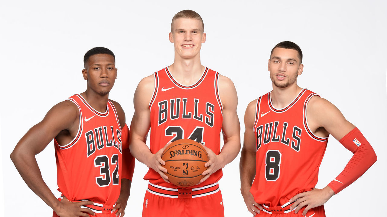 CHICAGO, IL - SEPTEMBER 25: Kris Dunn #32, Lauri Markkanen #24 and Zach LaVine #8 of the Chicago Bulls poses for a portrait during the 2017-18 NBA Media Day on September 25, 2017 at the United Center in Chicago, Illinois. Mandatory Copyright Notice: Copyright 2017 NBAE