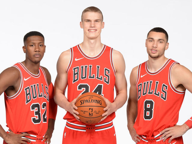 CHICAGO, IL - SEPTEMBER 25: Kris Dunn #32, Lauri Markkanen #24 and Zach LaVine #8 of the Chicago Bulls poses for a portrait during the 2017-18 NBA Media Day on September 25, 2017 at the United Center in Chicago, Illinois. Mandatory Copyright Notice: Copyright 2017 NBAE