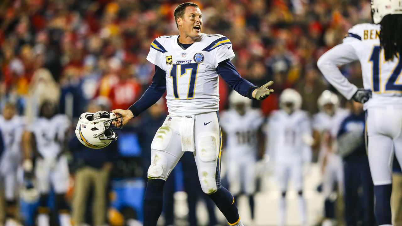 KANSAS CITY, MO - DECEMBER 13: Quarterback Philip Rivers #17 of the Los Angeles Chargers protests the lack of a penalty for a helmet-to-helmet tackle from linebacker Dorian O'Daniel #44 of the Kansas City Chiefs in the fourth quarter at Arrowhead Stadium on December 13, 2018 in Kansas City, Missouri.